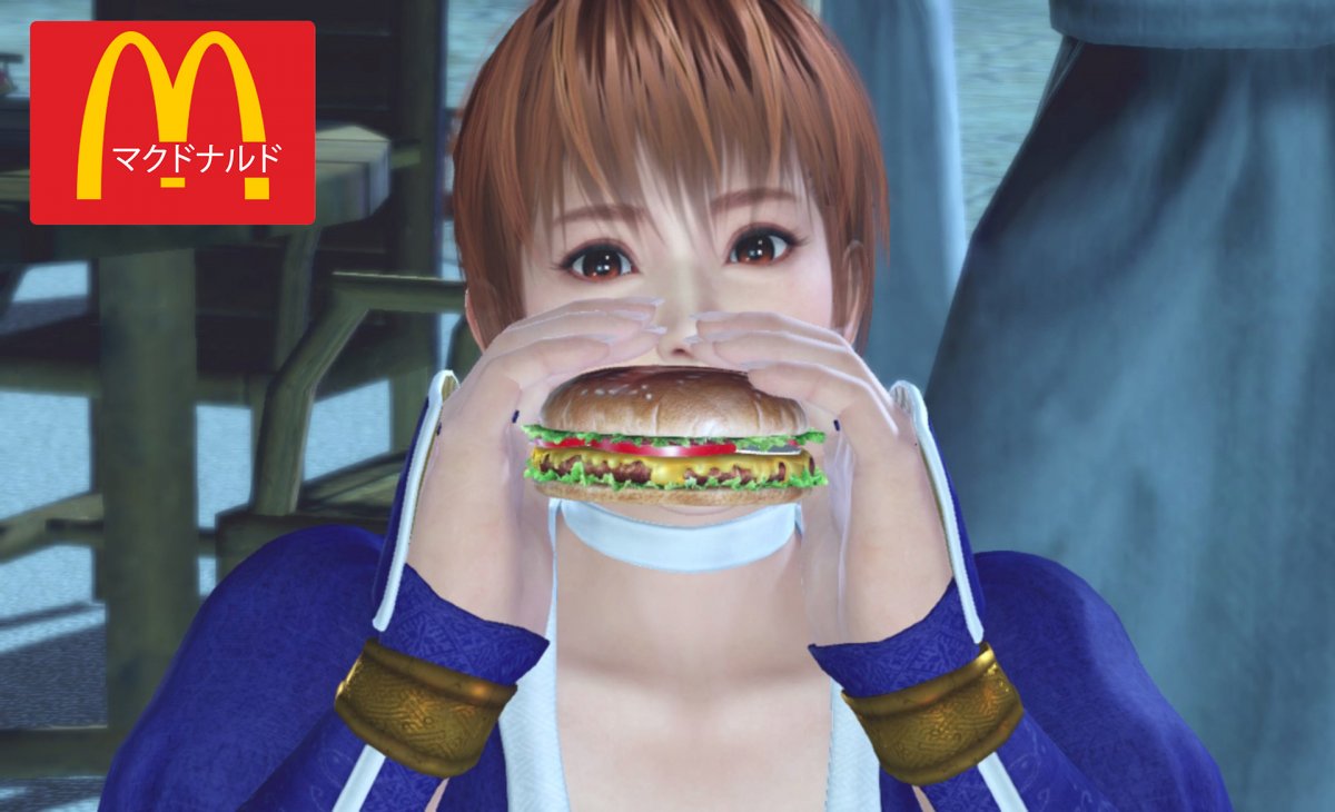 Kasumi eating a McDonald's Burger in DOAXVV Resized.jpg